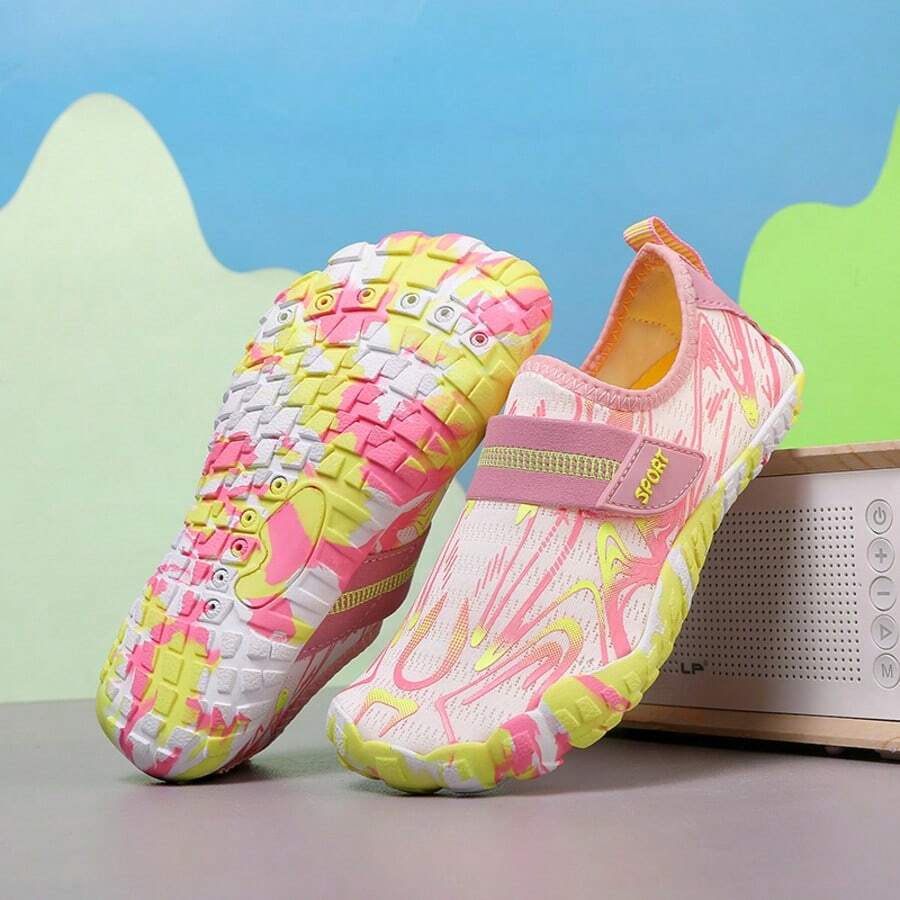 Breathable kids water shoes in white with all-over print, featuring lace-up detail and slip-on design for boys and girls.