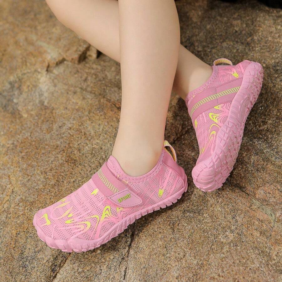 Breathable kids water shoes in white with all-over print, featuring lace-up detail and slip-on design for boys and girls.