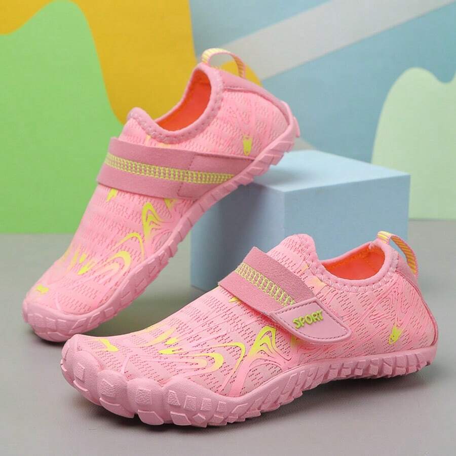 Breathable kids water shoes in white with all-over print, featuring lace-up detail and slip-on design for boys and girls.