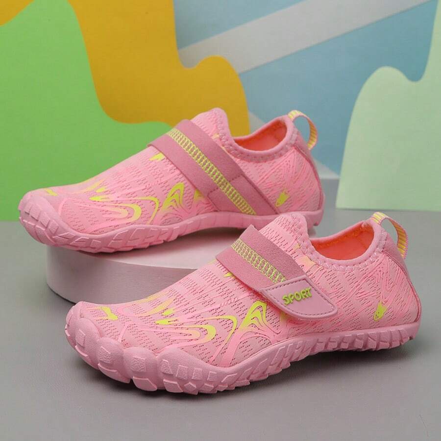 Breathable kids water shoes in white with all-over print, featuring lace-up detail and slip-on design for boys and girls.