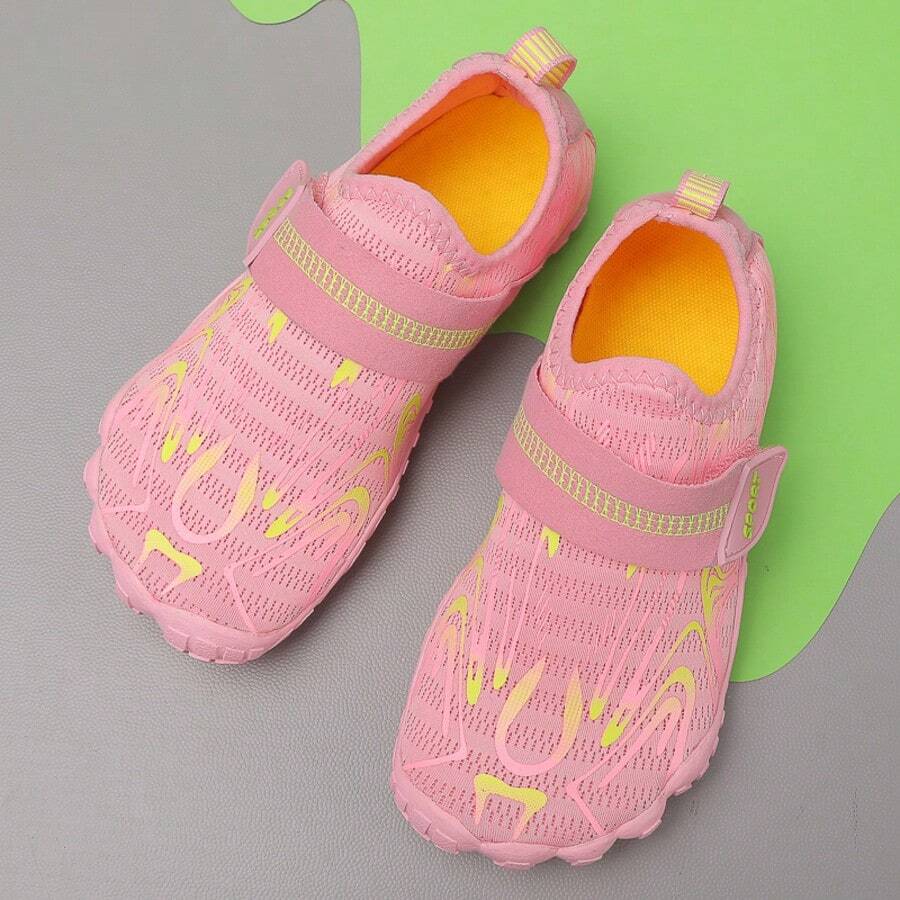 Breathable kids water shoes in white with all-over print, featuring lace-up detail and slip-on design for boys and girls.
