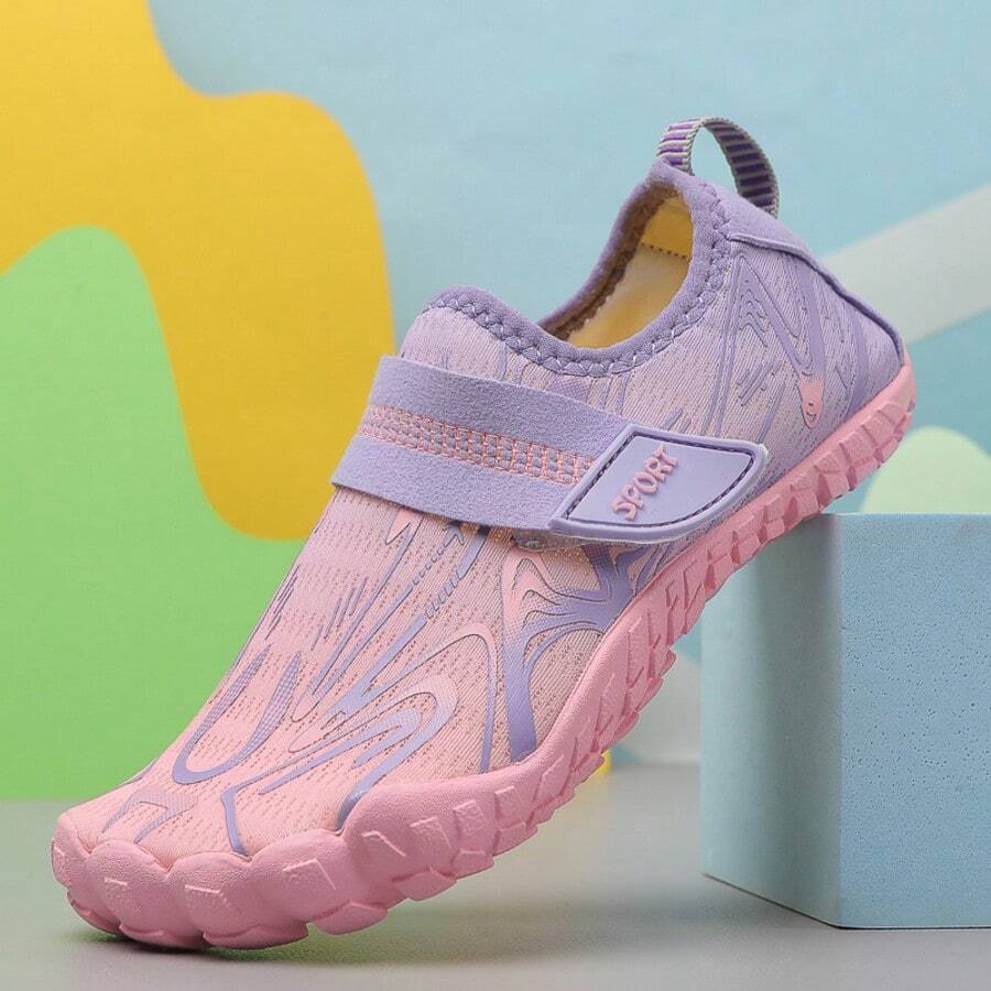 Breathable kids water shoes in white with all-over print, featuring lace-up detail and slip-on design for boys and girls.