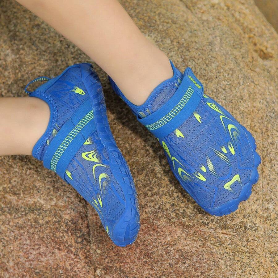 Breathable kids water shoes in white with all-over print, featuring lace-up detail and slip-on design for boys and girls.