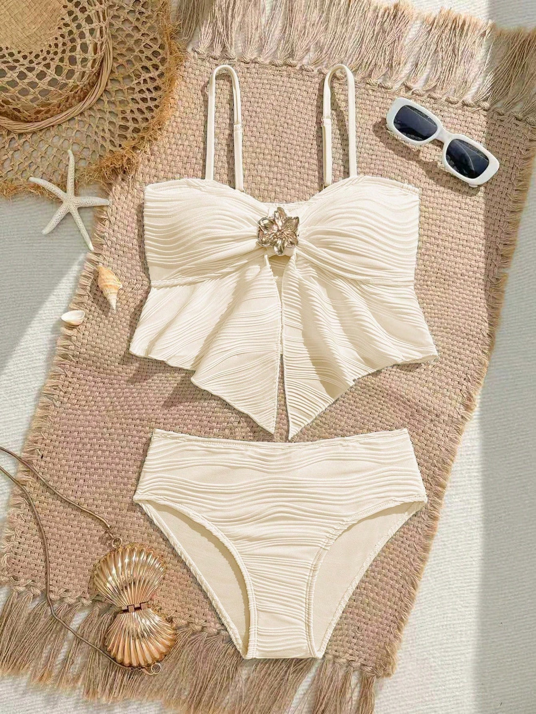 Tween girls 2-piece tankini swimwear set in apricot with a textured jacquard look, asymmetrical spaghetti-strap sleeveless top, and matching mid-waist short bikini bottoms.