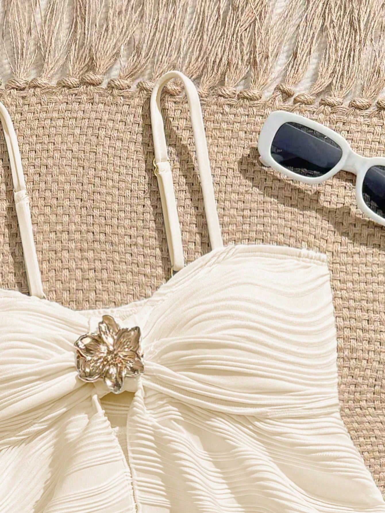 Tween girls 2-piece tankini swimwear set in apricot with a textured jacquard look, asymmetrical spaghetti-strap sleeveless top, and matching mid-waist short bikini bottoms.
