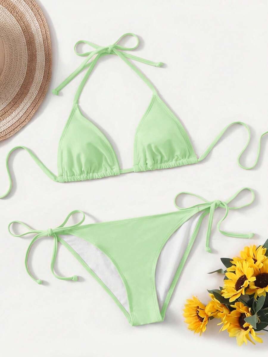 Women's high waist halter tie bikini swimwear set featuring triangle cups, wireless bra with removable padding, and tie side bottoms.