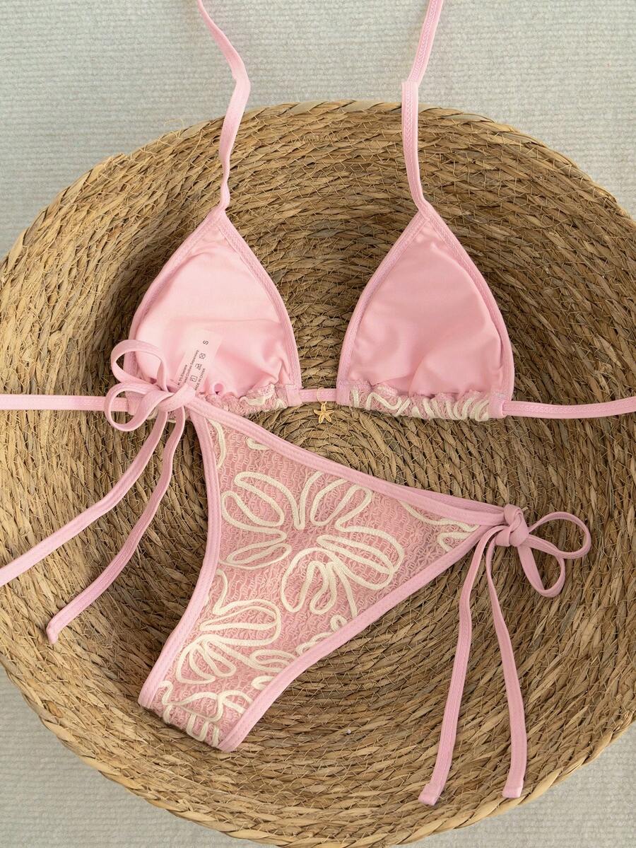 Apricot 2-piece bikini swimwear set featuring a textured halter triangle cup top with knot details and matching tie-side bottoms for women.