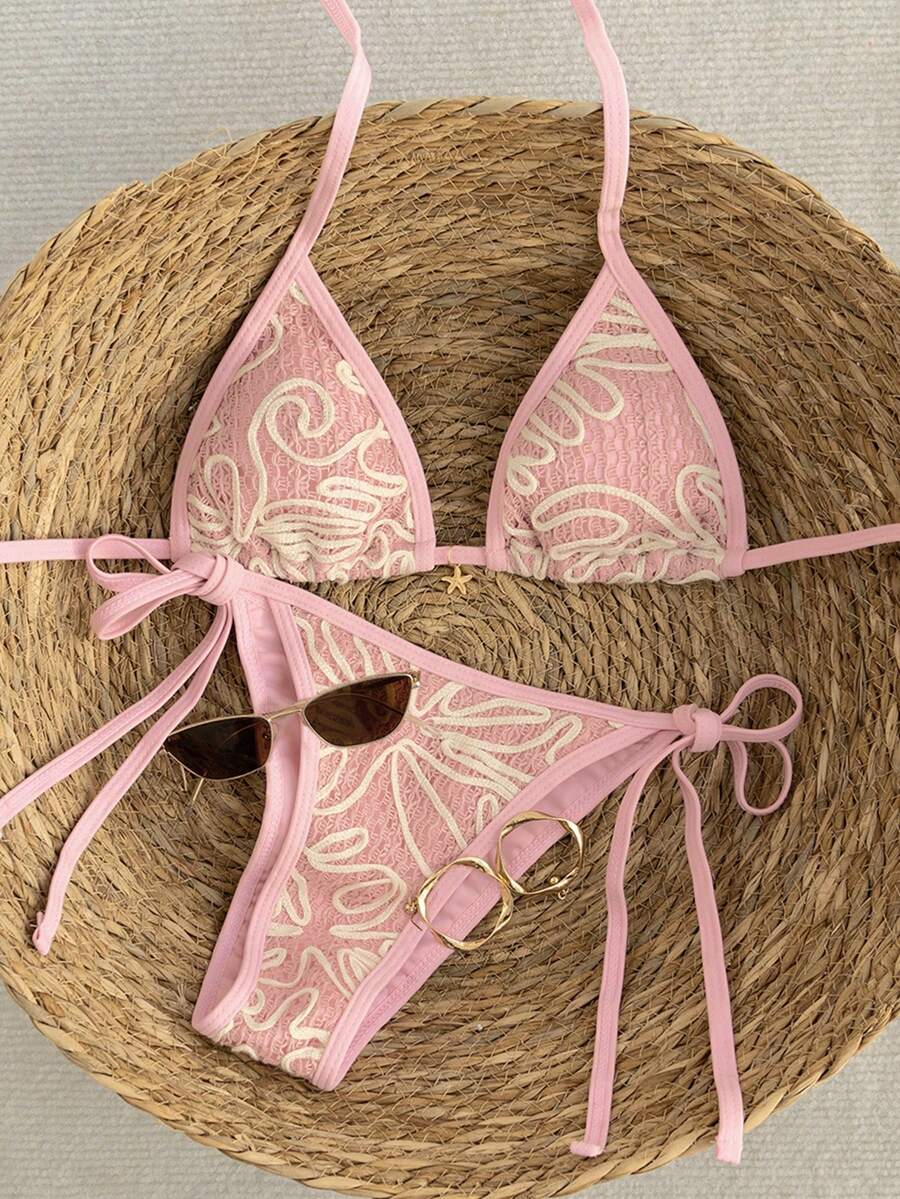 Apricot 2-piece bikini swimwear set featuring a textured halter triangle cup top with knot details and matching tie-side bottoms for women.