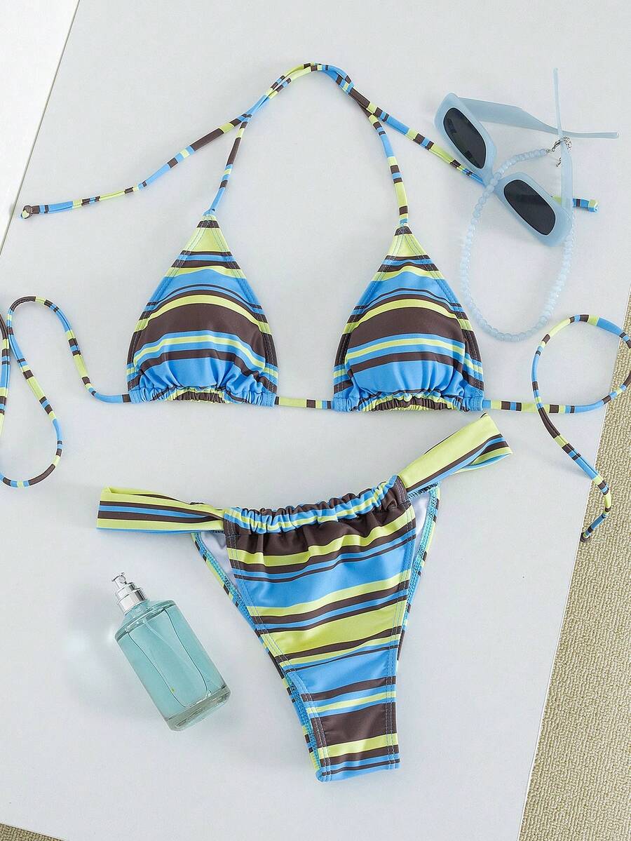 Women's striped halter two-piece swimsuit featuring a lace-up triangle top with removable padding and high-cut low-waist bikini bottoms.