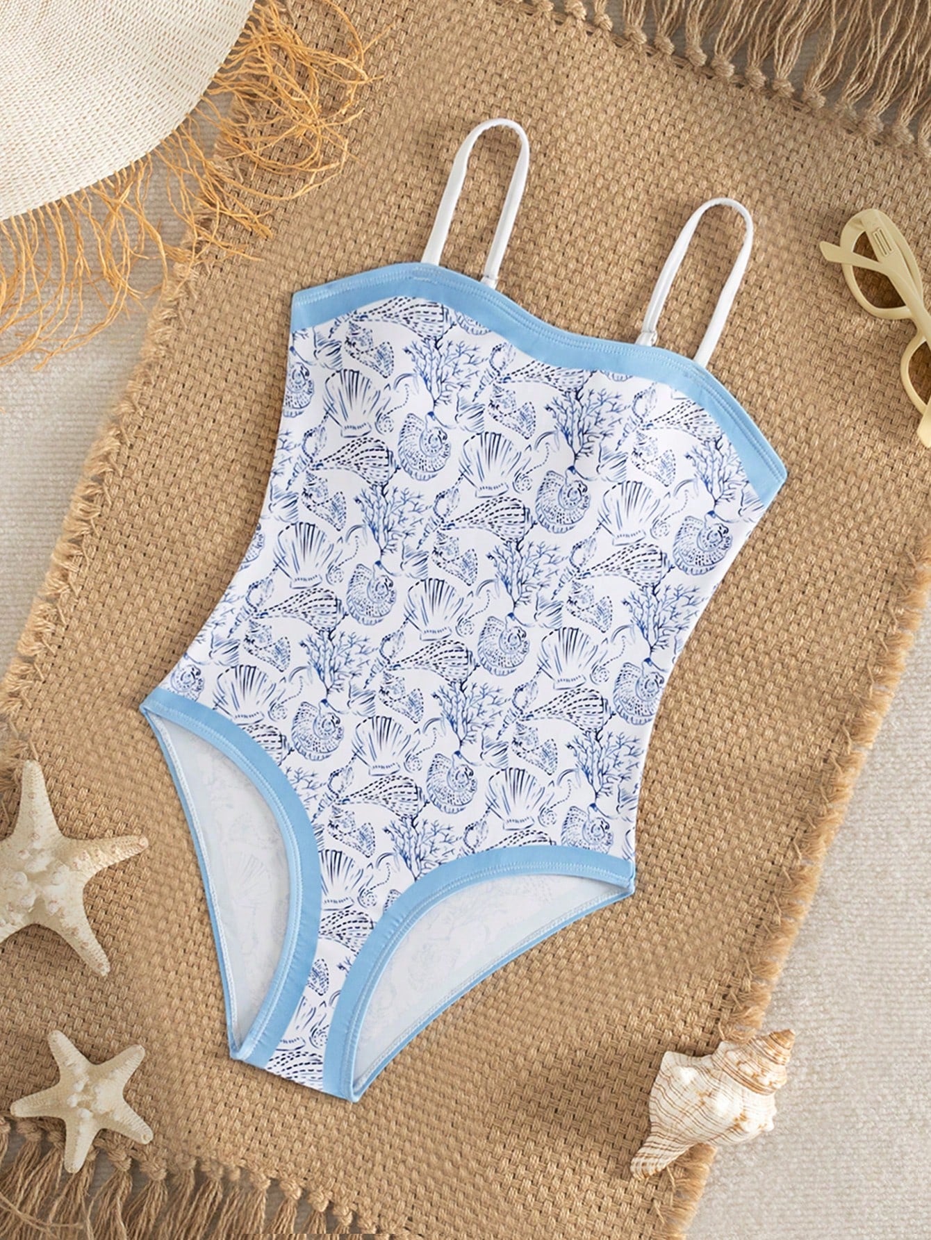 Purple tween girls one-piece swimsuit with asymmetrical neckline, cut-out waist, striped pattern, fitted silhouette, and lined body.