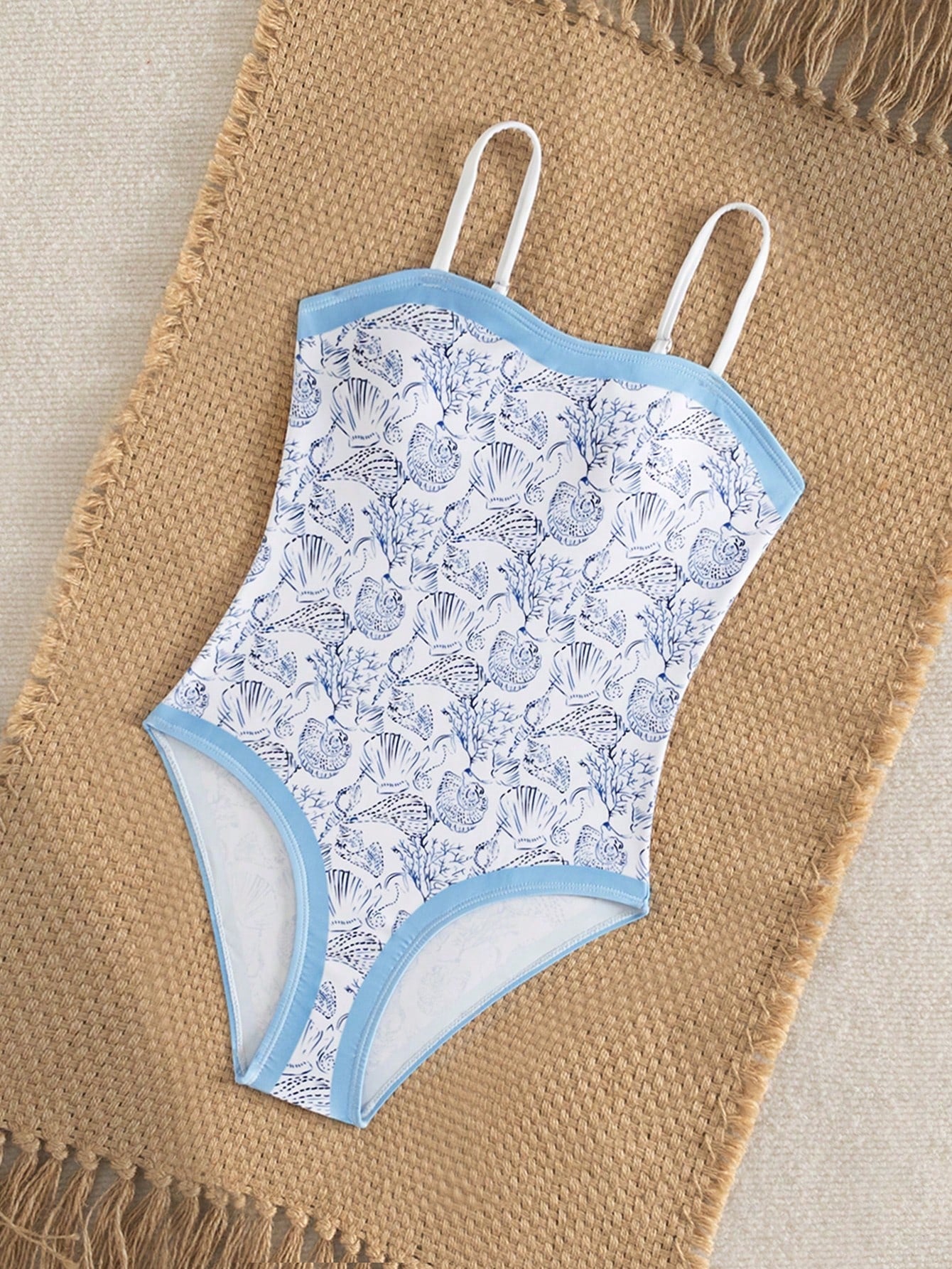 Purple tween girls one-piece swimsuit with asymmetrical neckline, cut-out waist, striped pattern, fitted silhouette, and lined body.