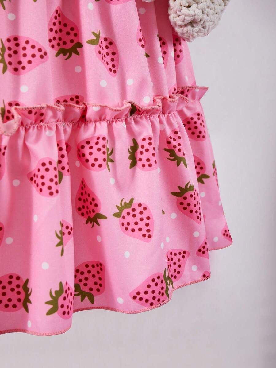 Pink girls strawberry print midi dress with short puff sleeves, square neck, shirred high waist, and tiered layered skirt.