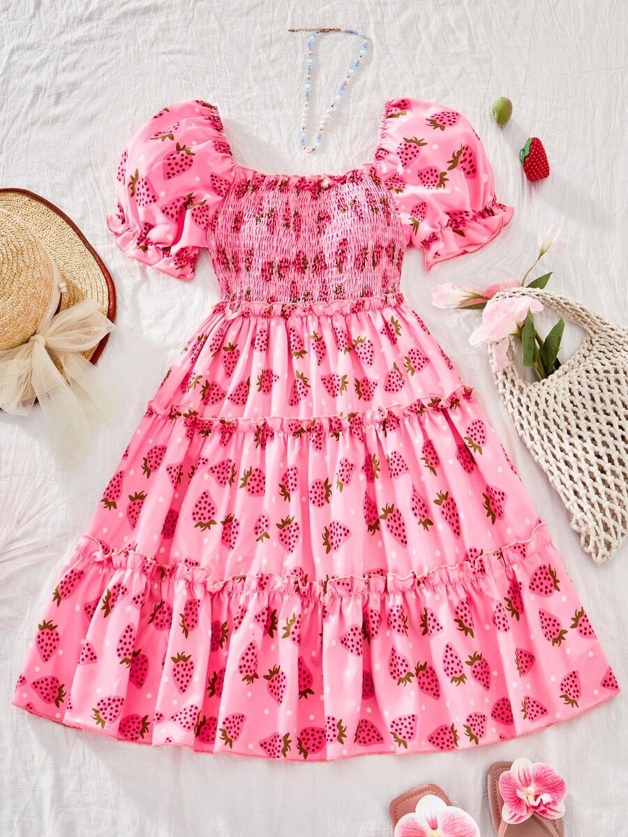 Pink girls strawberry print midi dress with short puff sleeves, square neck, shirred high waist, and tiered layered skirt.
