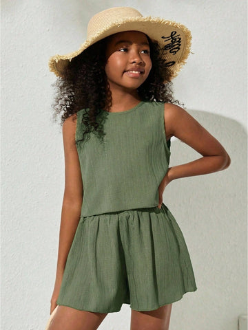 Tween girls army green casual outfit featuring a sleeveless round neck top with button details paired with matching woven loose shorts.