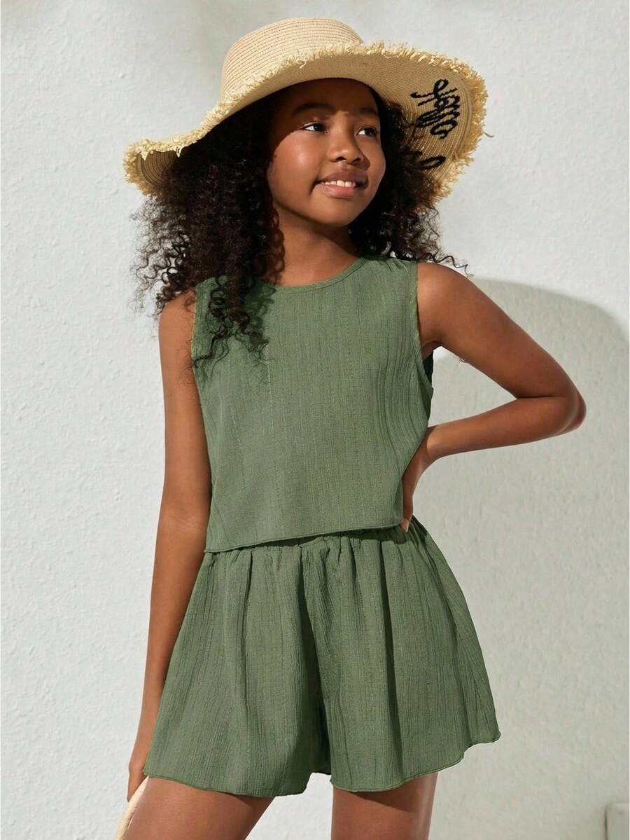 Tween girls army green casual outfit featuring a sleeveless round neck top with button details paired with matching woven loose shorts.