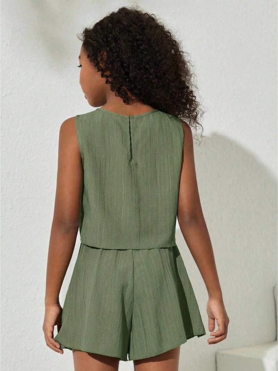 Tween girls army green casual outfit featuring a sleeveless round neck top with button details paired with matching woven loose shorts.