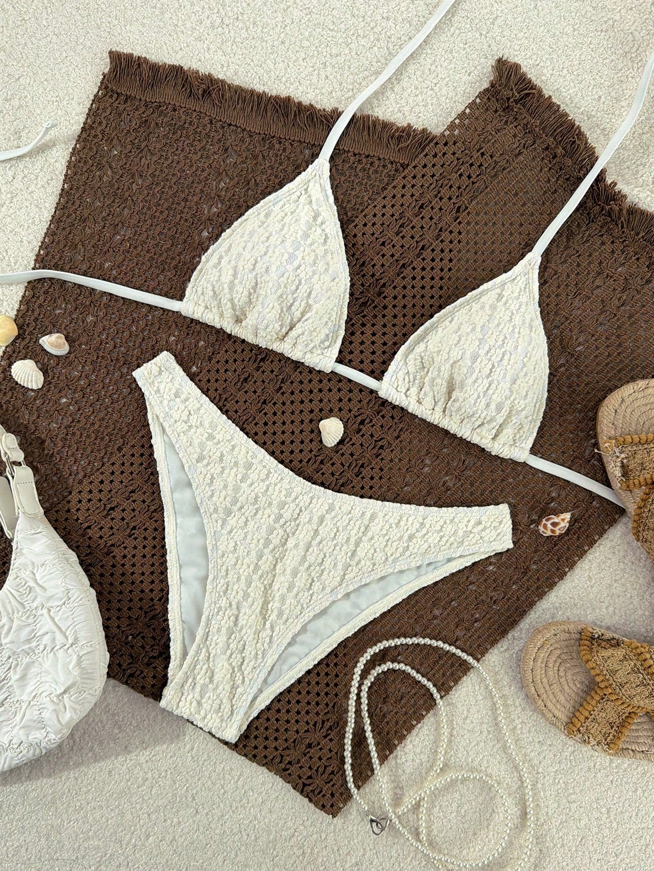 Women's apricot 2-piece halter bikini set featuring a wireless triangle top with tie-back detail and high-waisted high-cut bottoms.