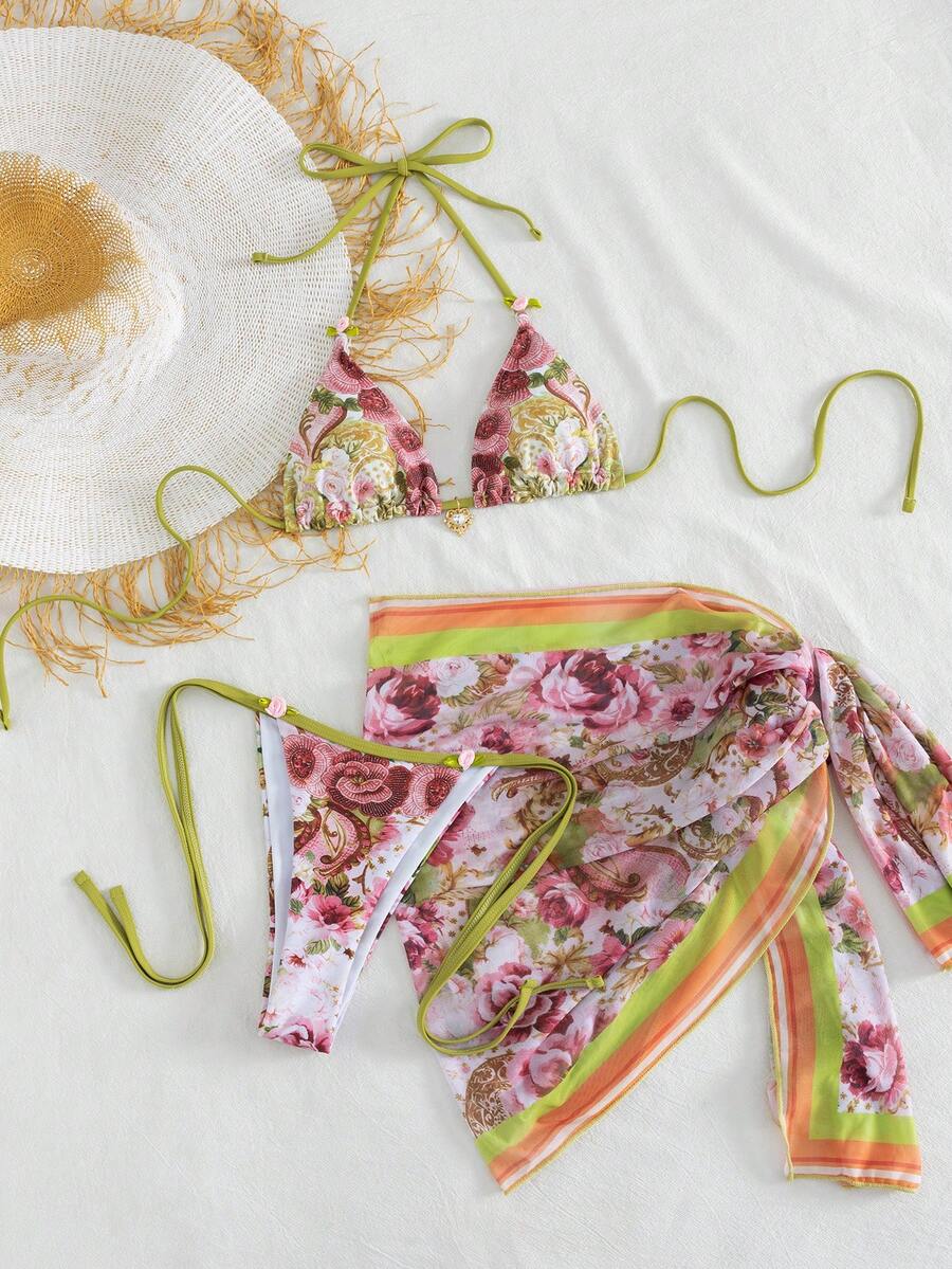 Women's 3-piece pink floral print bikini set featuring a wireless halter top with removable padding and matching tie-side swim bottoms.