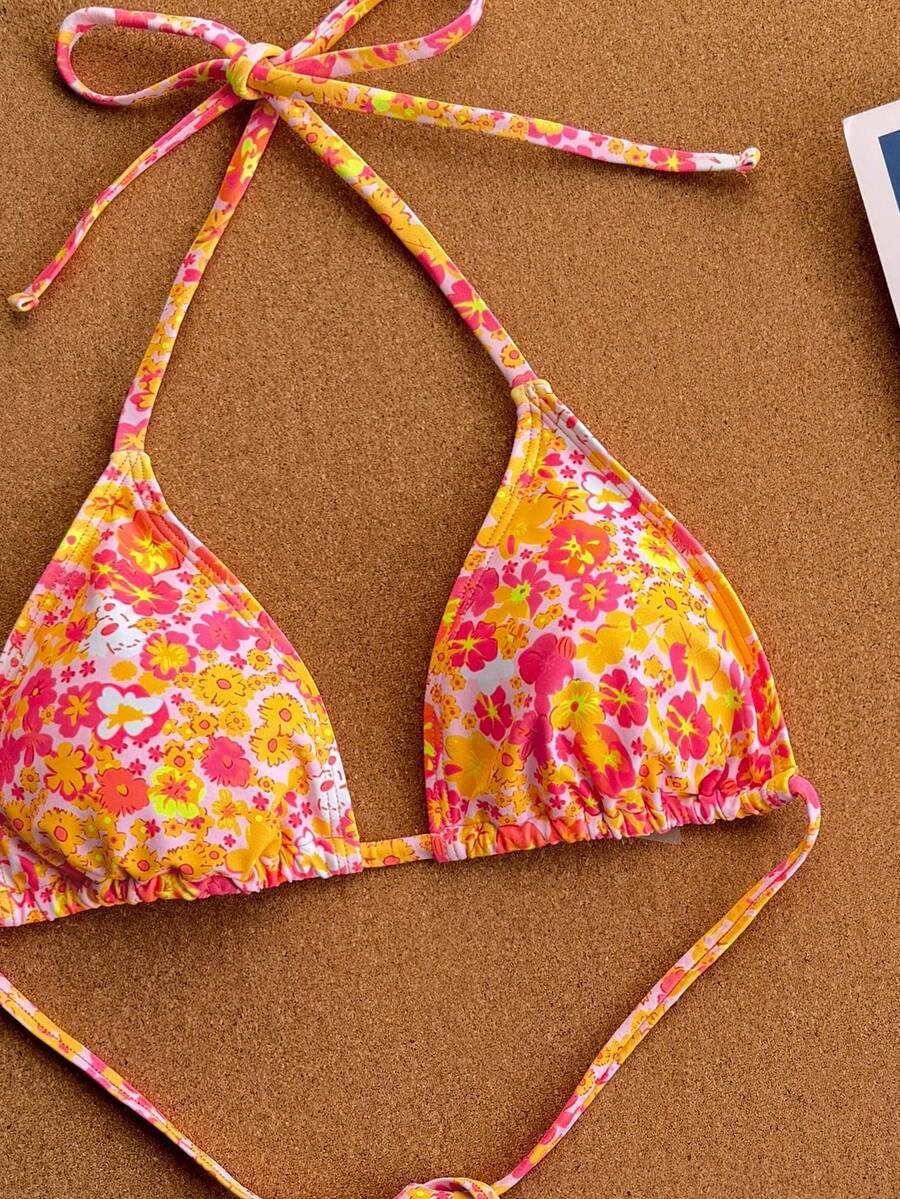 Women's apricot 2-piece halter bikini set featuring a wireless triangle top with tie-back detail and high-waisted high-cut bottoms.