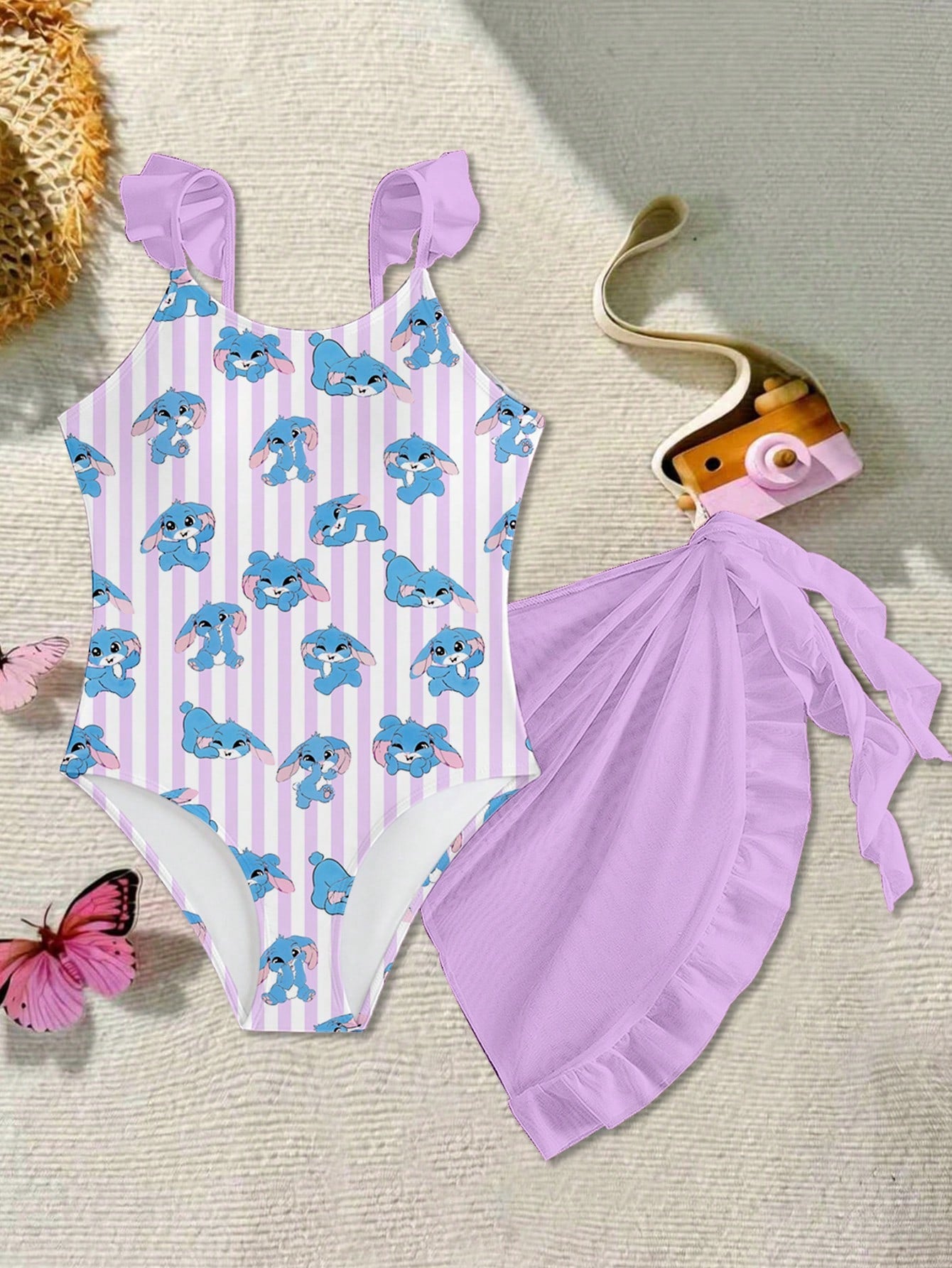 Tween girls one-piece swimsuit in leopard print with ruffle shoulder straps, scoop neckline, fitted shape, and attached ruffle hem skirt; sleeveless, mid-waist skirt bottom, and lined body for swimming, vacation, and summer beach wear.