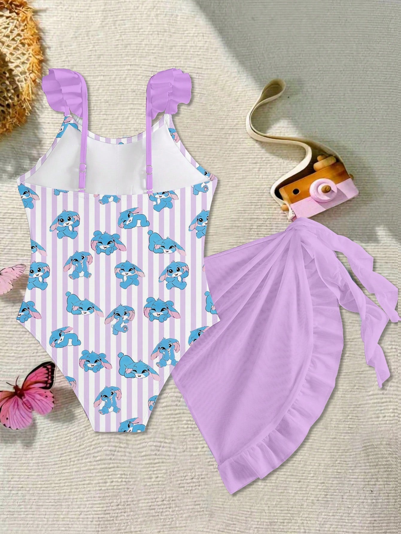 Tween girls one-piece swimsuit in leopard print with ruffle shoulder straps, scoop neckline, fitted shape, and attached ruffle hem skirt; sleeveless, mid-waist skirt bottom, and lined body for swimming, vacation, and summer beach wear.