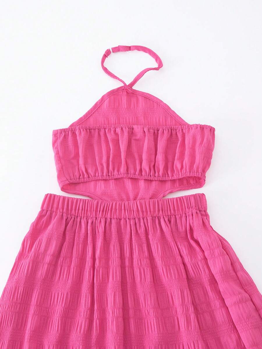 Tween girls floral halter dress with backless sleeveless design, belted high waist, shirred details, appliques, and flared A-line midi silhouette for summer vacation or graduation outfit.