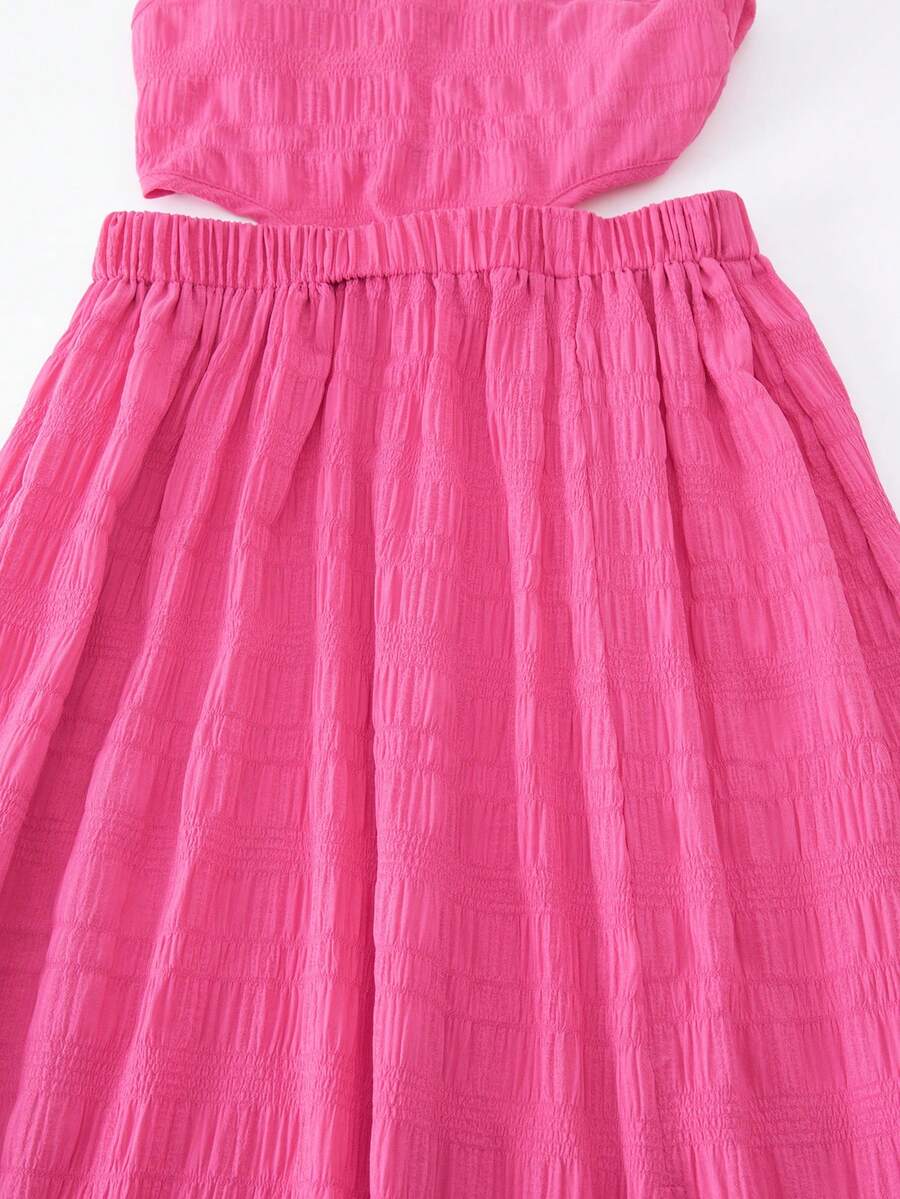 Tween girls floral halter dress with backless sleeveless design, belted high waist, shirred details, appliques, and flared A-line midi silhouette for summer vacation or graduation outfit.