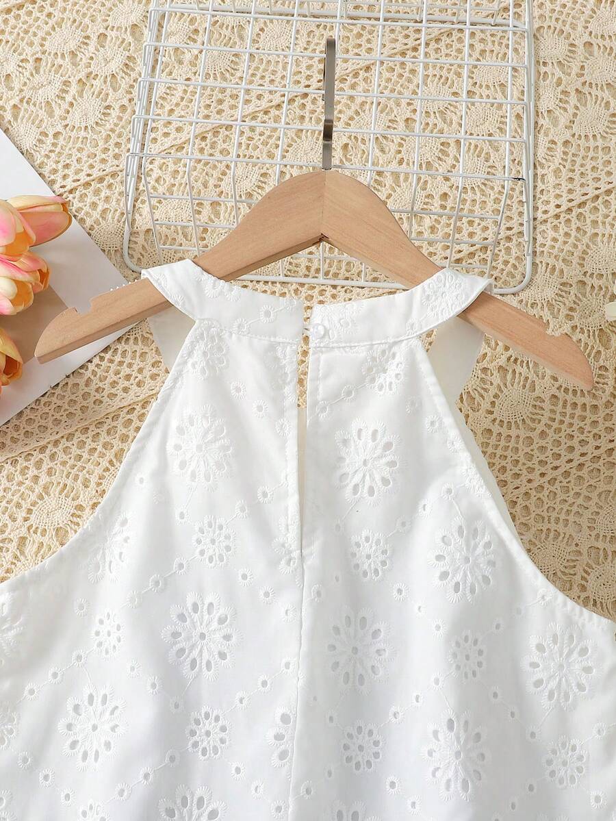 Tween girls floral halter A-line dress with contrast lace, applique and fringe details, sleeveless short length in polyester