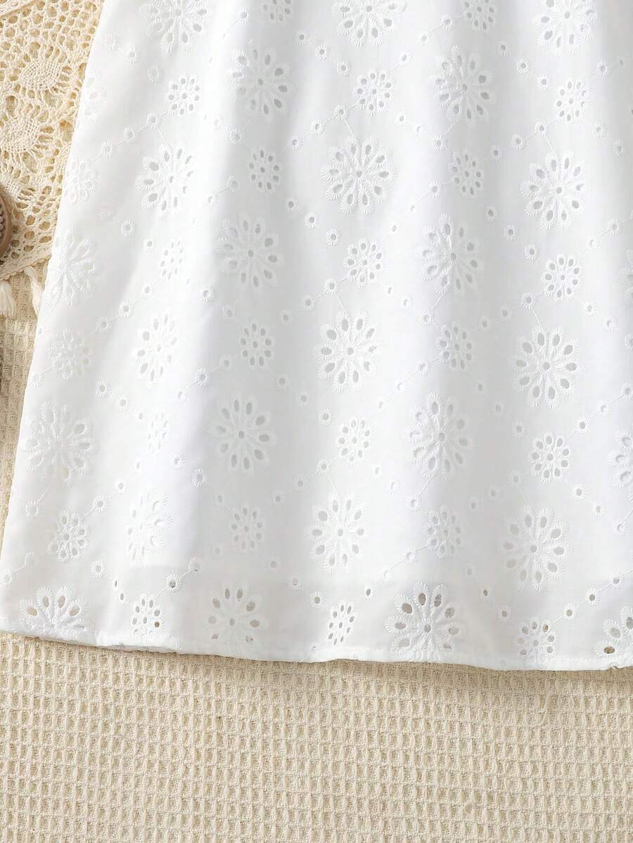Tween girls floral halter A-line dress with contrast lace, applique and fringe details, sleeveless short length in polyester