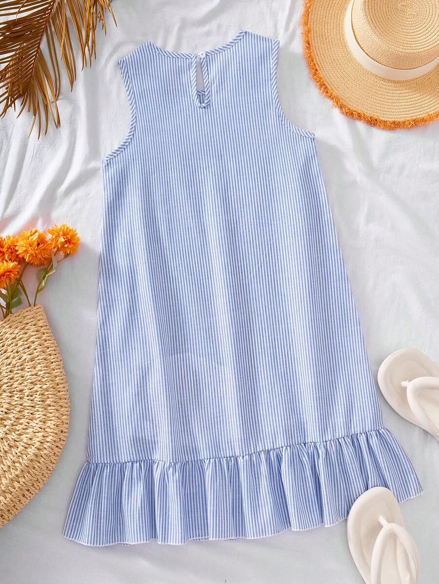Tween girls casual leopard print smock mini dress featuring a round neck and flounce ruffle hem.