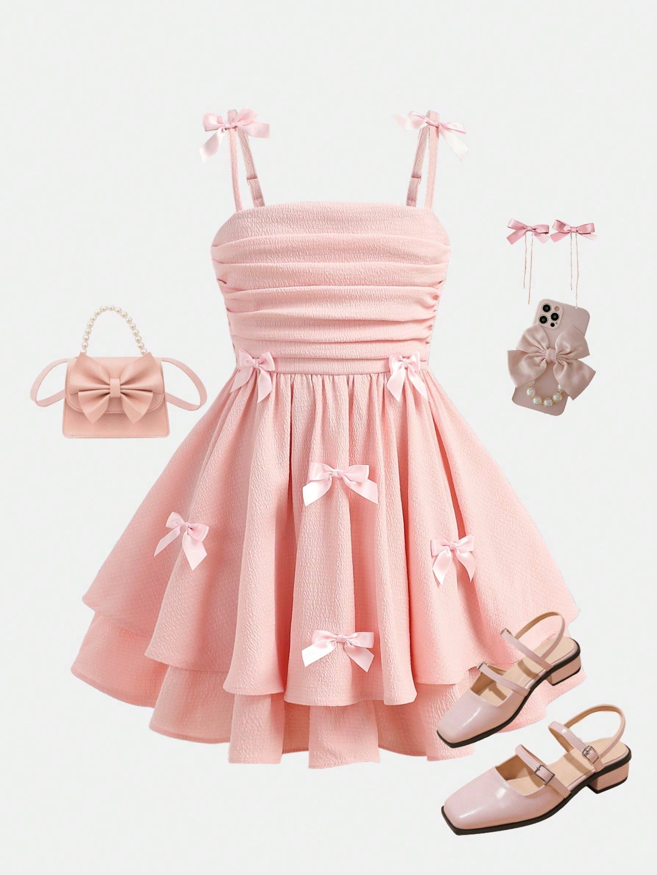 Tween girls apricot tiered cami dress with spaghetti straps, high waist, and slim fit layered hem.