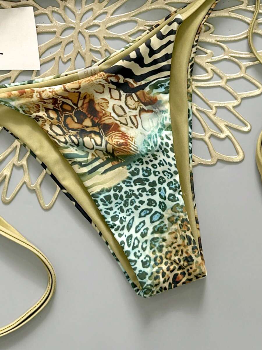 Women's vintage leopard print 2-piece bikini set featuring a high waist tie-side bottom and a halter neck triangle top.