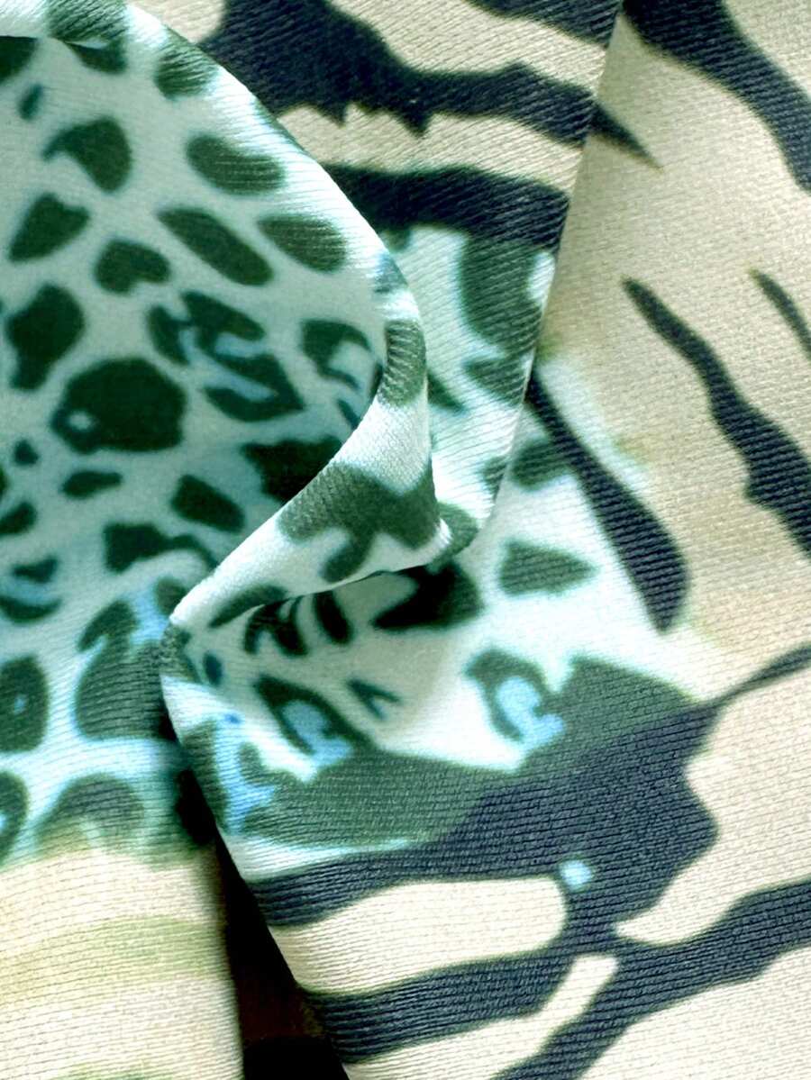 Women's vintage leopard print 2-piece bikini set featuring a high waist tie-side bottom and a halter neck triangle top.