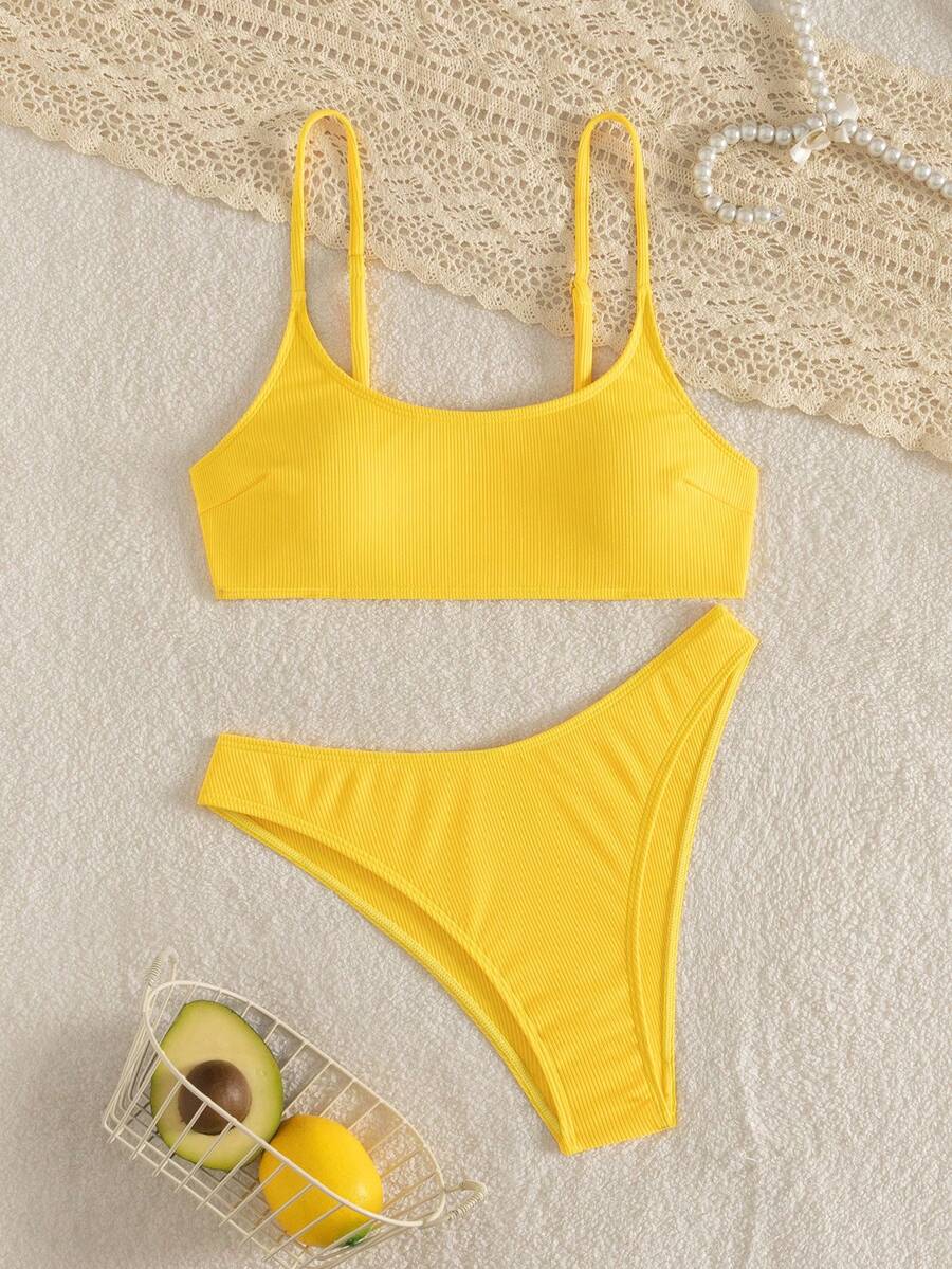 Apricot ribbed high waist two piece bikini swimsuit set for women featuring backless spaghetti strap top and high waisted bottoms.