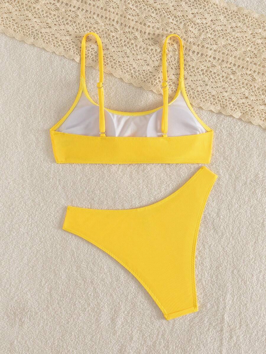 Apricot ribbed high waist two piece bikini swimsuit set for women featuring backless spaghetti strap top and high waisted bottoms.