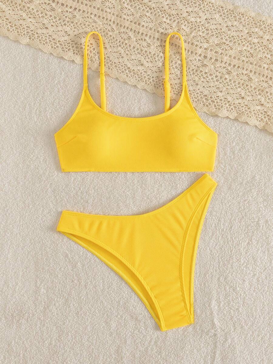 Apricot ribbed high waist two piece bikini swimsuit set for women featuring backless spaghetti strap top and high waisted bottoms.