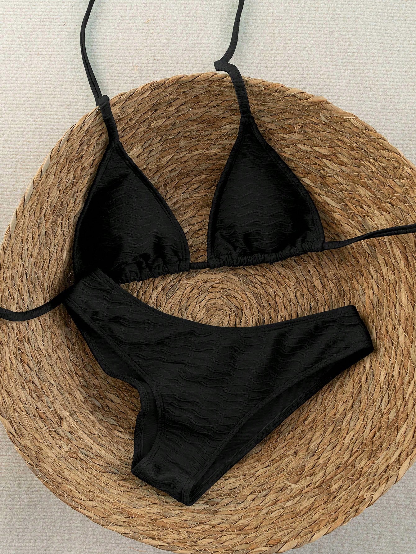 Women's apricot 2-piece halter bikini set featuring a wireless triangle top with tie-back detail and high-waisted high-cut bottoms.