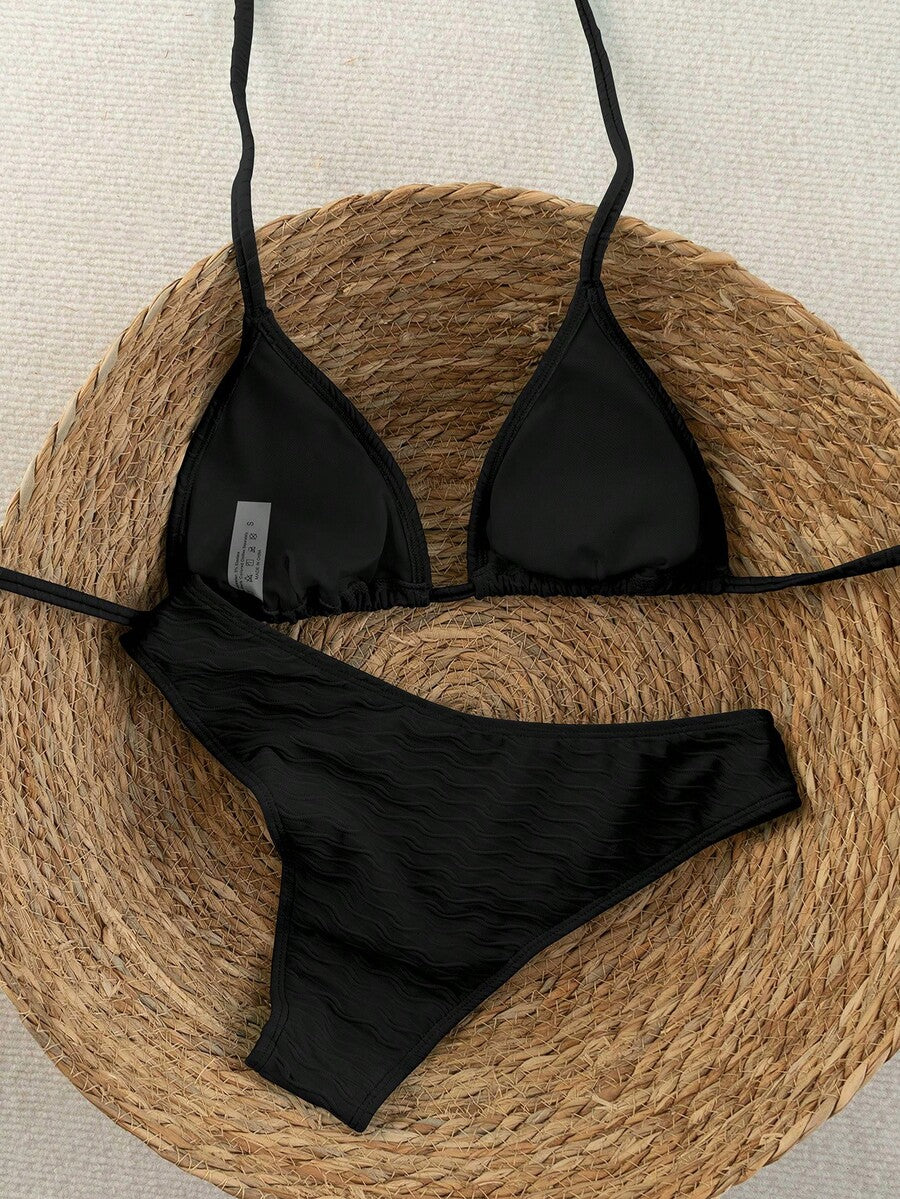 Women's apricot 2-piece halter bikini set featuring a wireless triangle top with tie-back detail and high-waisted high-cut bottoms.