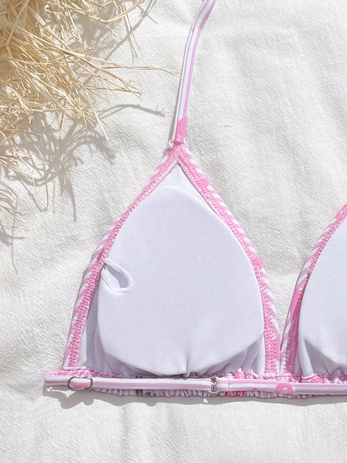 Tween girls 3-piece swimwear set in pink featuring a striped triangle halter bikini top with bow detail and adjustable neck and back ties, an adjustable mid-waist bikini bottom, and a sheer pink mesh skirt cover-up for beach or pool wear.
