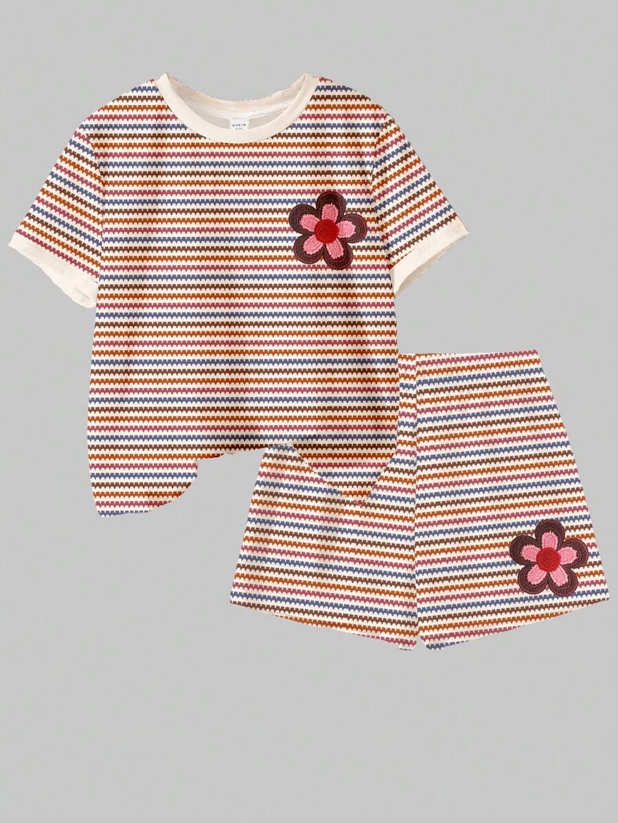 Tween girls multicolor tie-dye 2-piece outfit set featuring a drop-shoulder short-sleeve t-shirt and matching loose track shorts with side pockets.