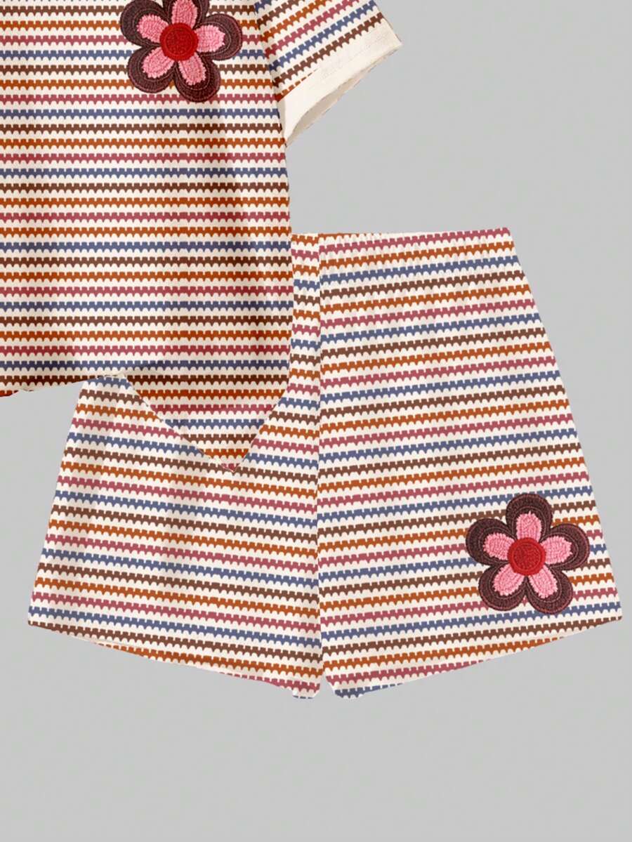 Tween girls multicolor tie-dye 2-piece outfit set featuring a drop-shoulder short-sleeve t-shirt and matching loose track shorts with side pockets.