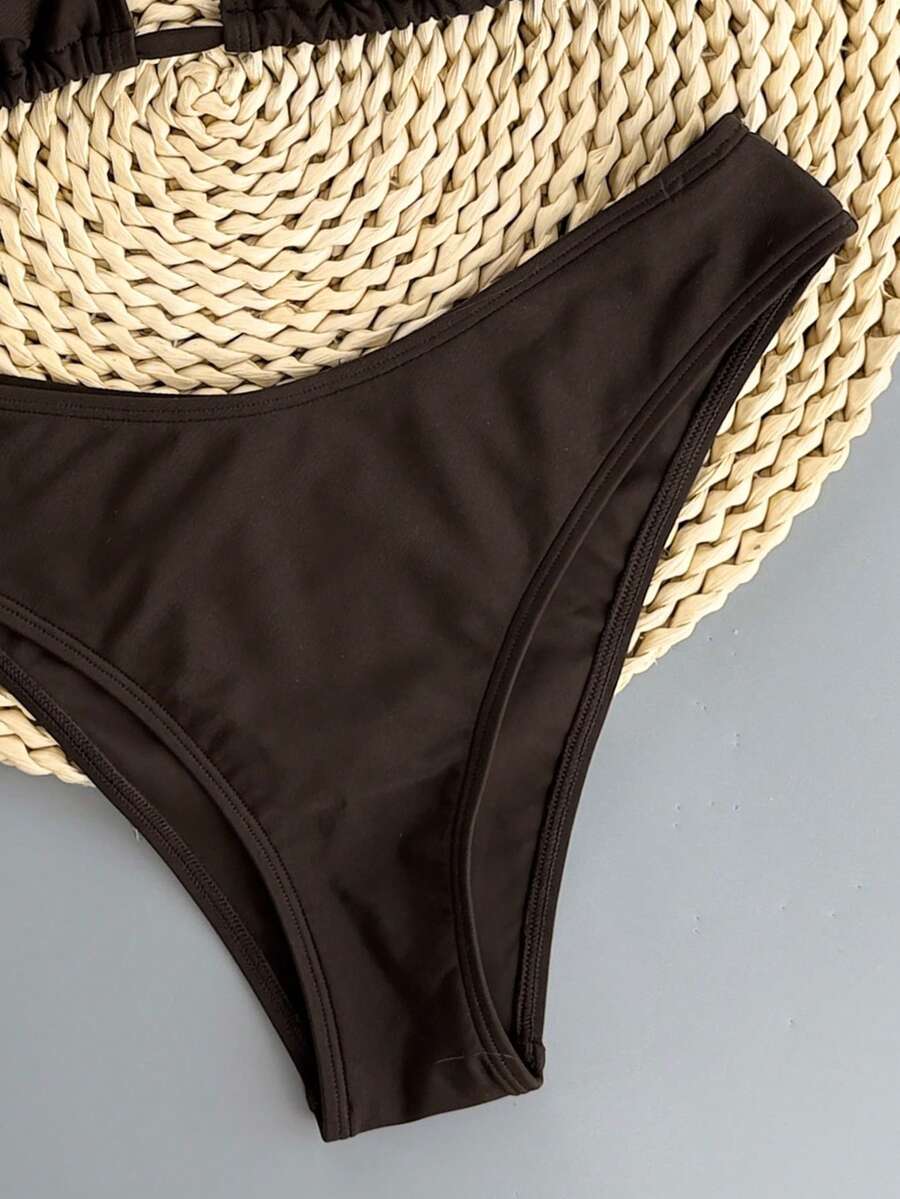 Women's apricot 2-piece halter bikini set featuring a wireless triangle top with tie-back detail and high-waisted high-cut bottoms.