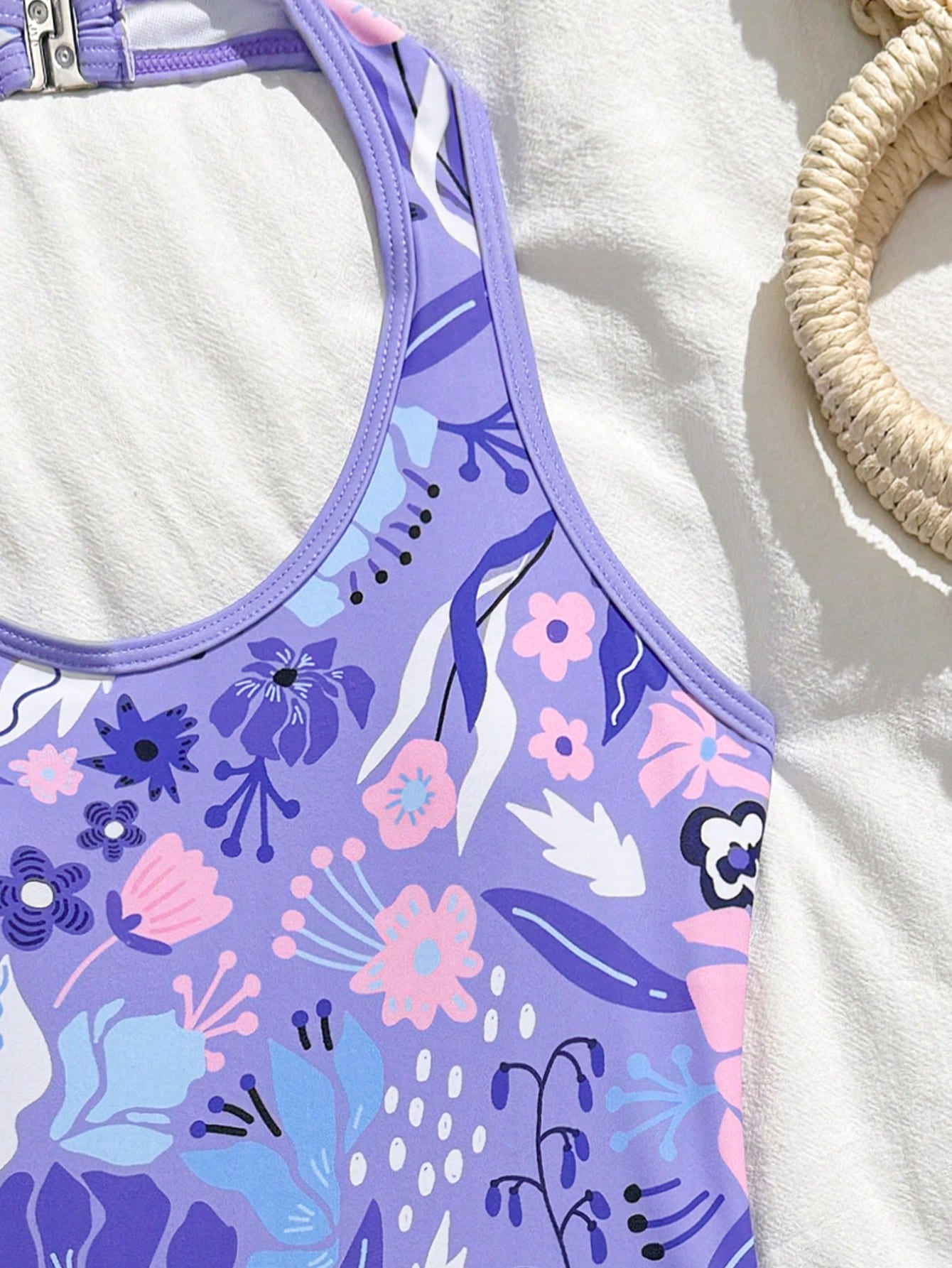 Girls 2-piece swimwear set featuring a butterfly print halter swimsuit top with contrast piping and separate mid-waist shorts; sleeveless, high-stretch, wireless design for beach and vacation wear.