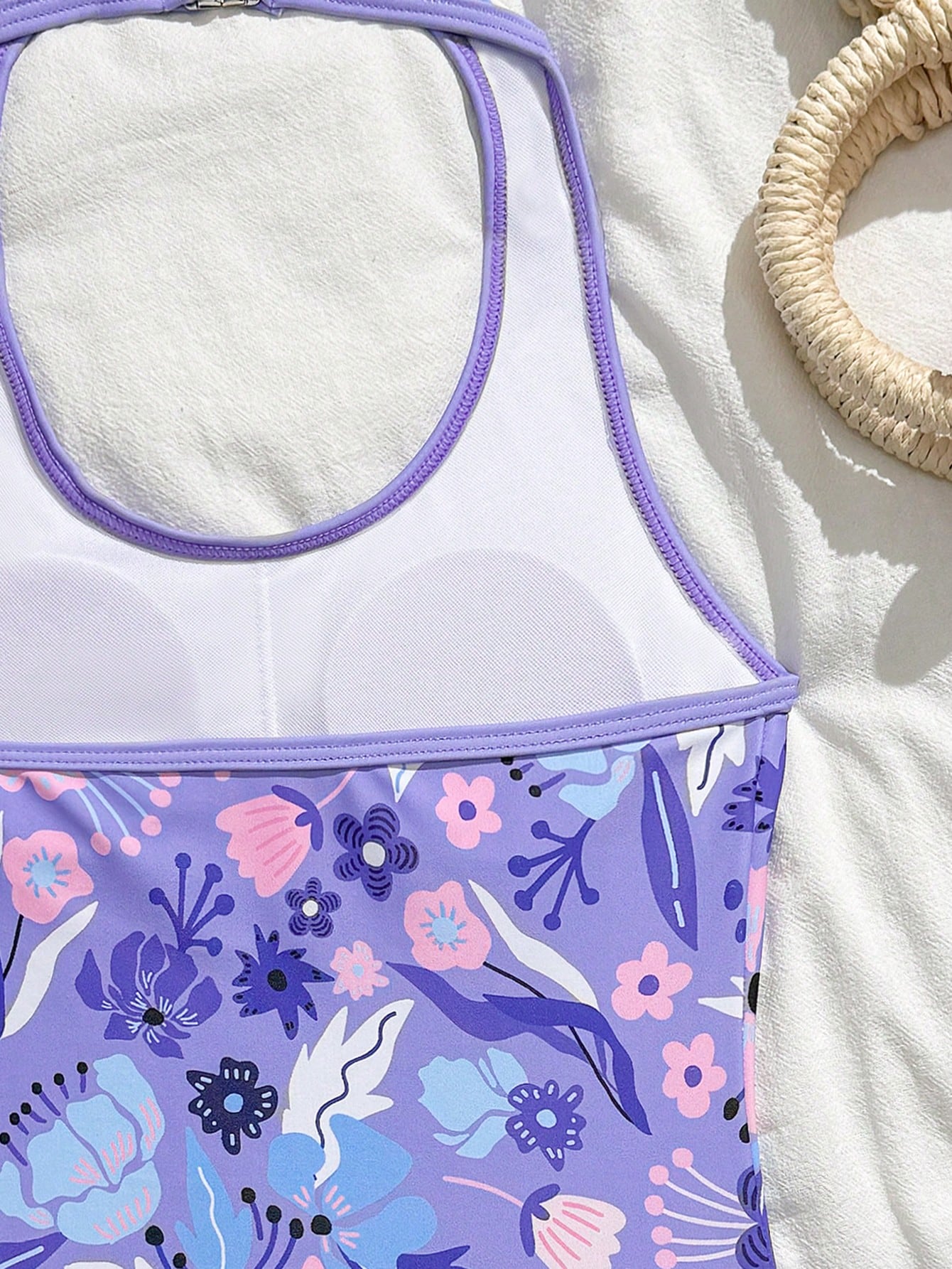 Girls 2-piece swimwear set featuring a butterfly print halter swimsuit top with contrast piping and separate mid-waist shorts; sleeveless, high-stretch, wireless design for beach and vacation wear.