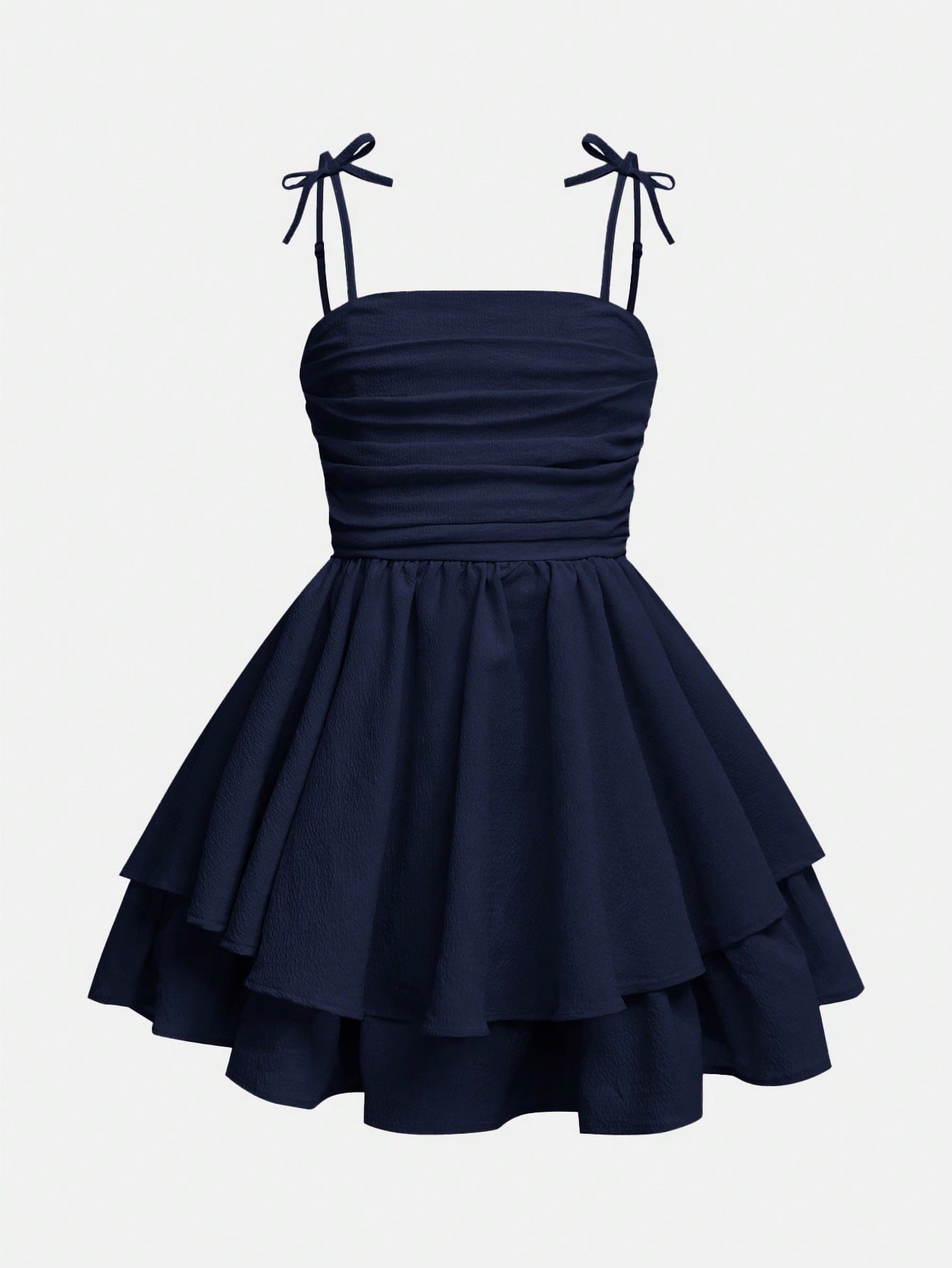 Tween girls apricot tiered cami dress with spaghetti straps, high waist, and slim fit layered hem.