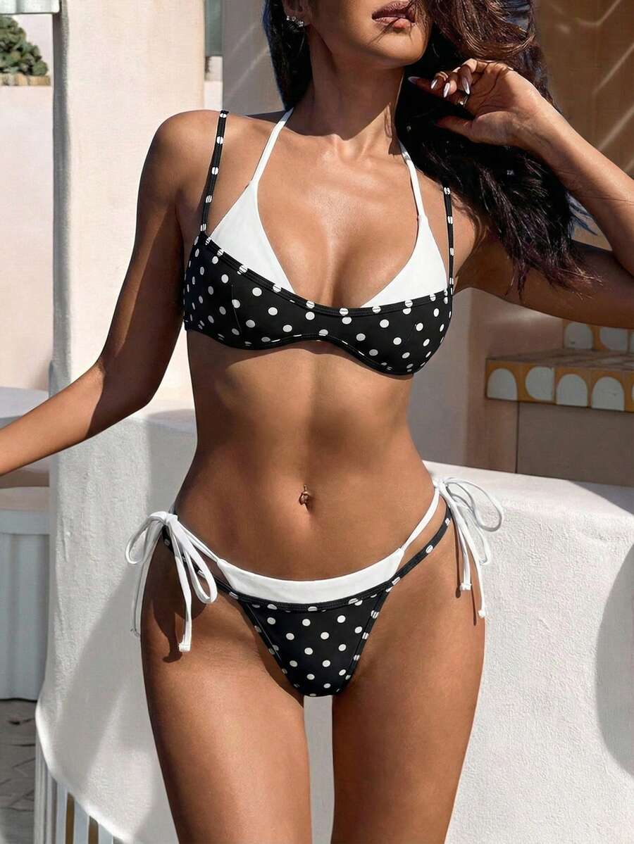 Women's retro polka dot high waist bikini swimsuit set with spaghetti straps and knot tie-back top.