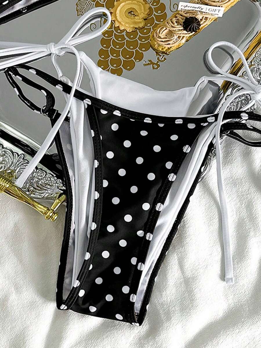 Women's retro polka dot high waist bikini swimsuit set with spaghetti straps and knot tie-back top.
