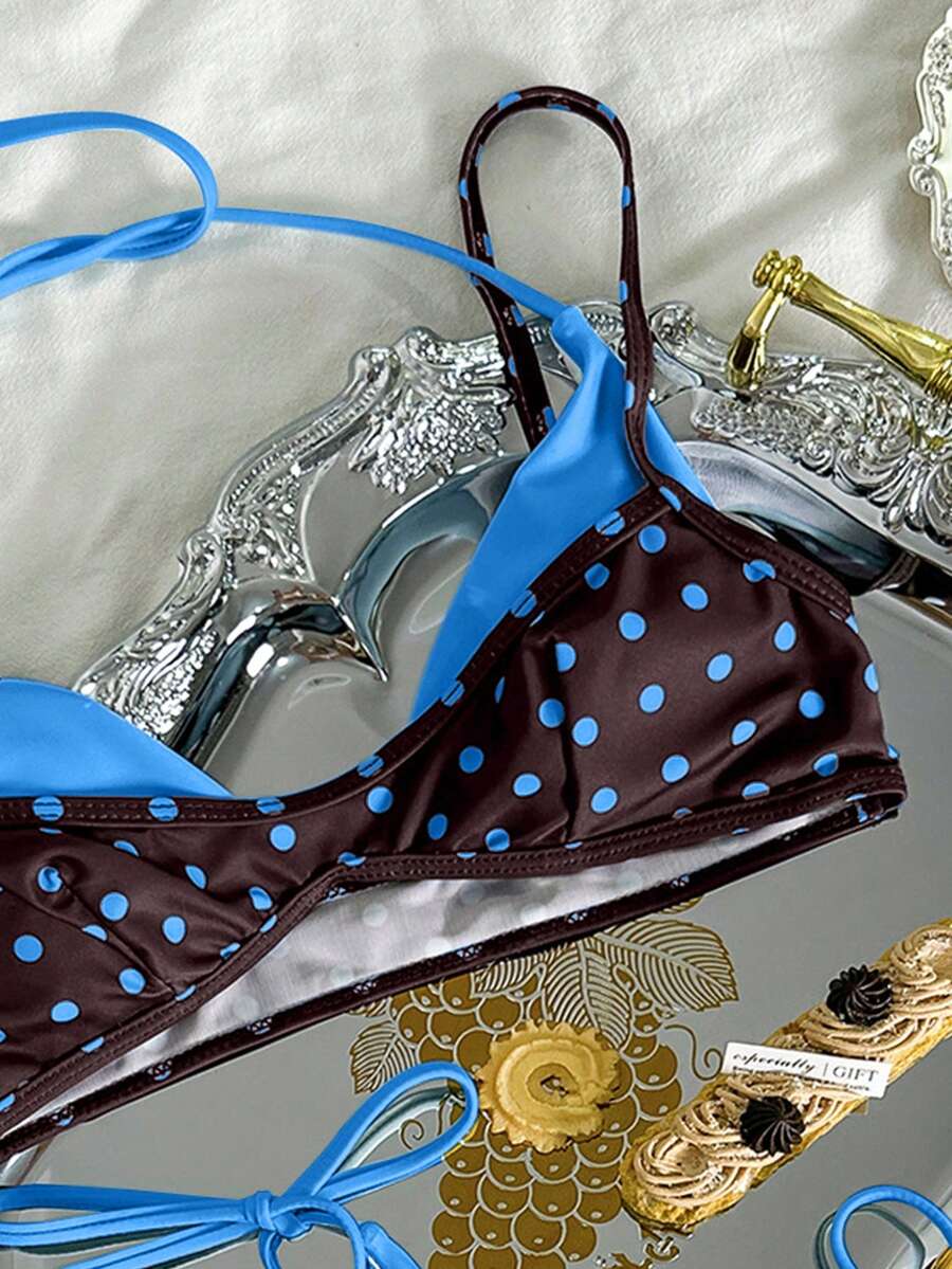 Women's retro polka dot high waist bikini swimsuit set with spaghetti straps and knot tie-back top.