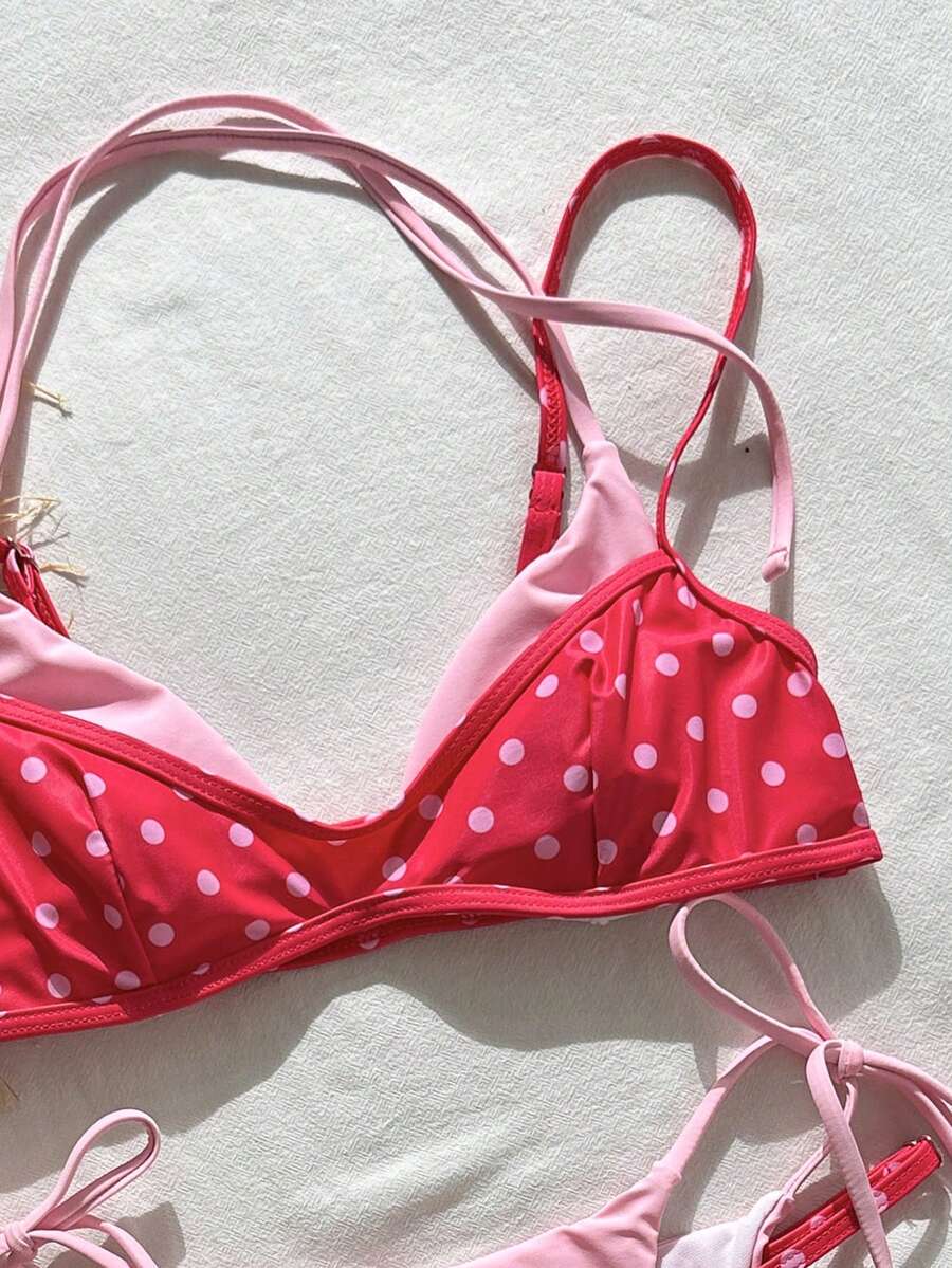 Women's retro polka dot high waist bikini swimsuit set with spaghetti straps and knot tie-back top.
