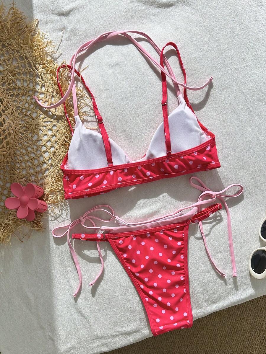 Women's retro polka dot high waist bikini swimsuit set with spaghetti straps and knot tie-back top.